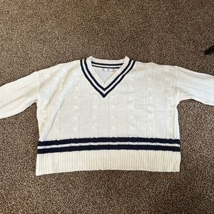 White knitted top with blue stripes